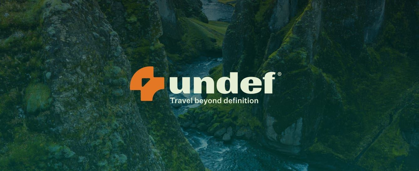 The Undef mark over a mountain view